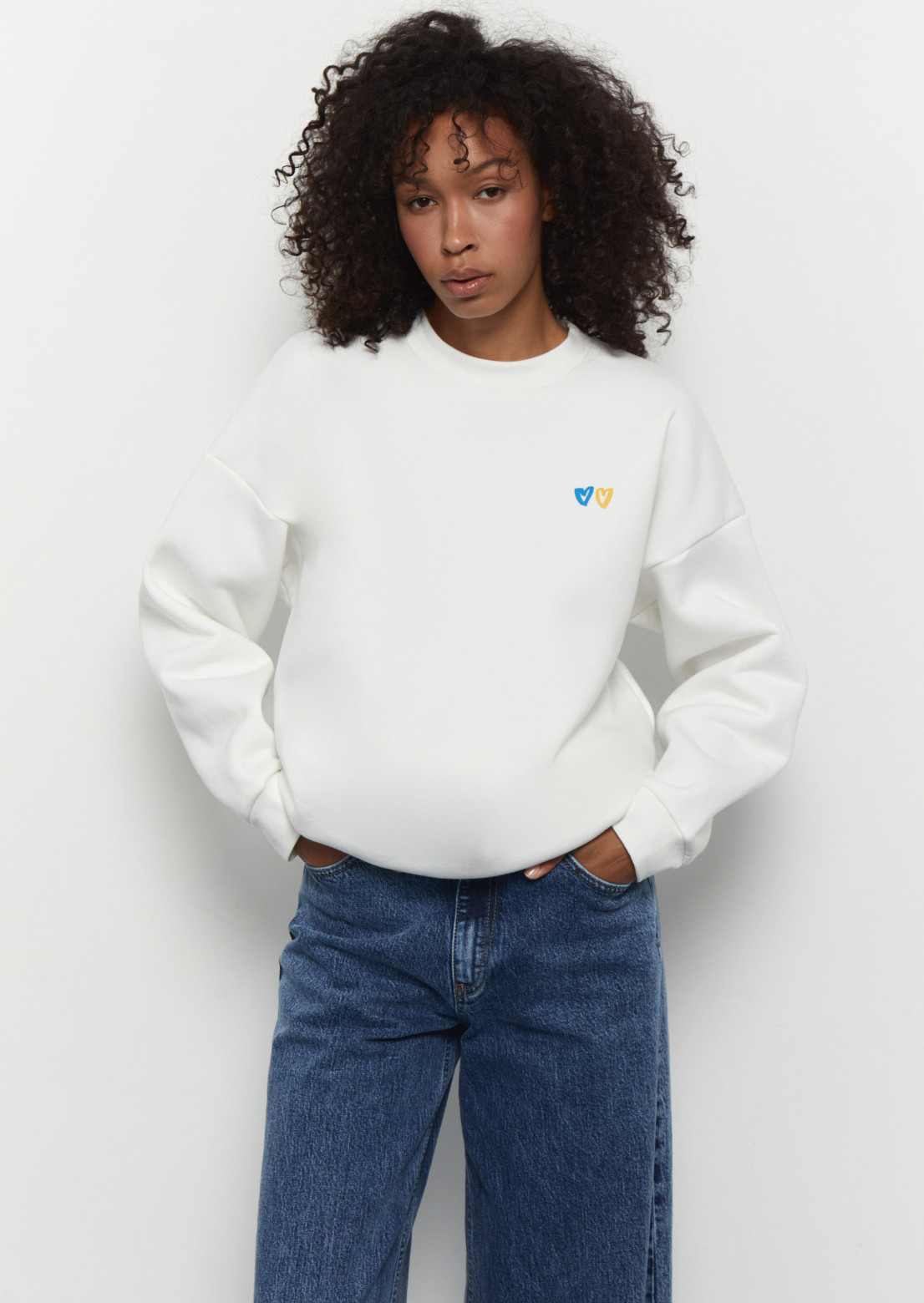 Milk color three-thread insulated sweatshirt with print "Два серця" 